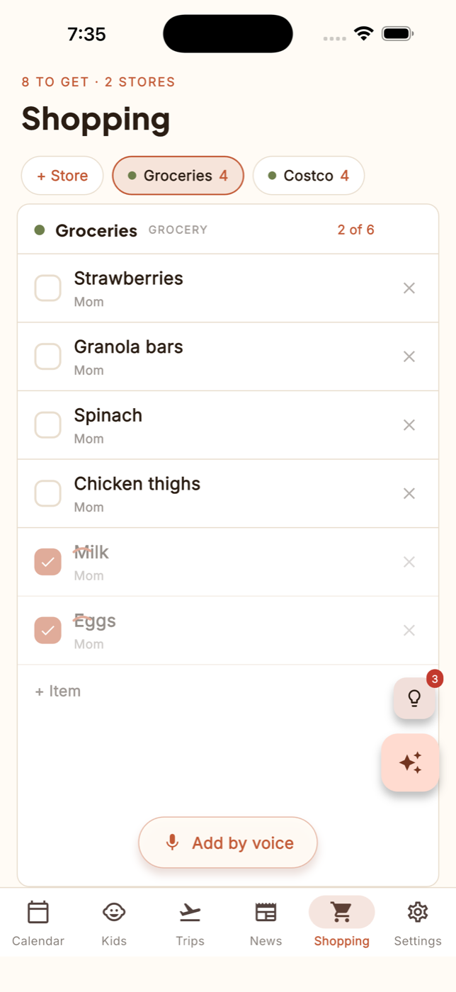 FamGlow shopping list with per-store tabs, checked-off items, and add-by-voice
